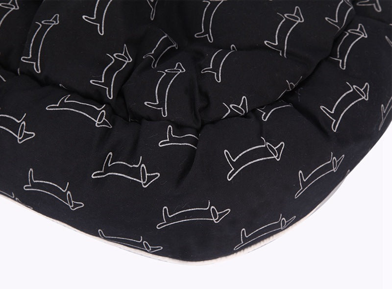 High-quality, durable round pet bed in soft, neutral tones.